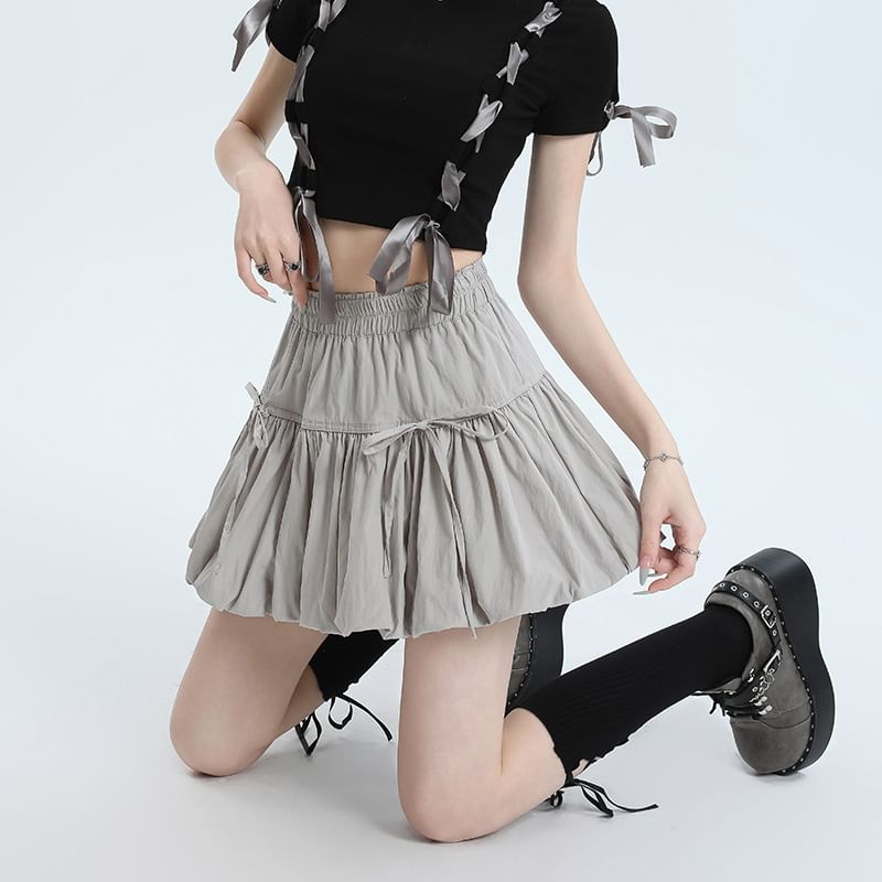 Shira - 束腰純色蝴蝶結拼接迷你A字氣球裙