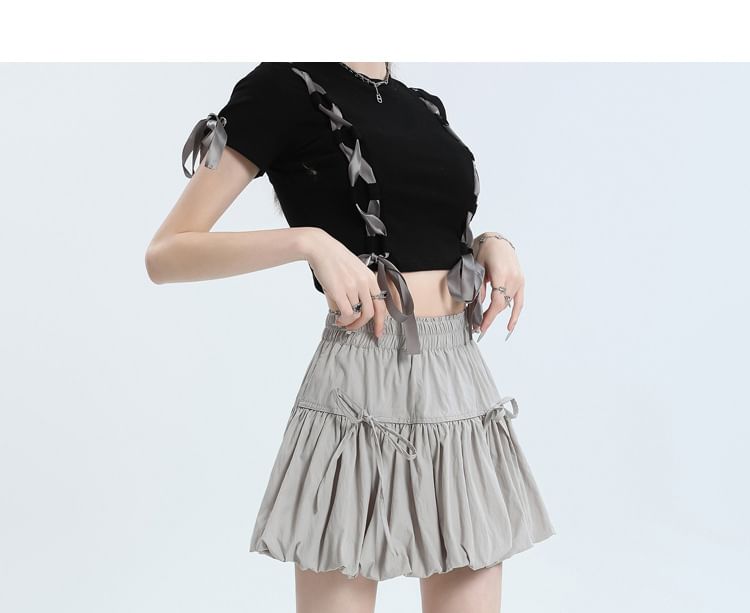 Shira - 束腰純色蝴蝶結拼接迷你A字氣球裙